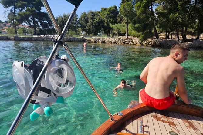 Zadar: Aperol Spritz, Snorkeling & Island Vibes on a Speedboat - Otok Galevac: swimming with monastery gardens in the background