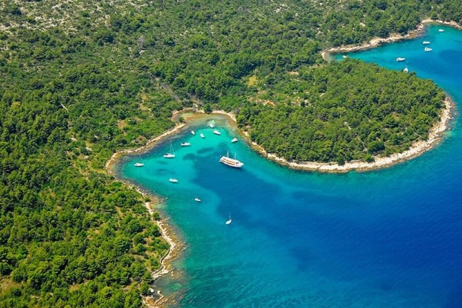 Zadar: RIB boat Tour to Hidden Bays with Snorkeling & Drinks - Entering the day at Molo Branimira and getting to Kokolo Marine